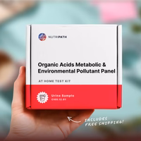 Hand holding a NutriPath at-home metabolic and pollutant test kit.